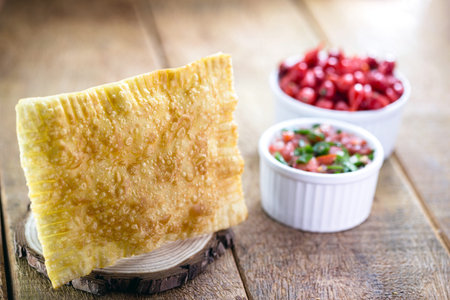Brazilian pastry, fried, salty typical of Brazil, with copyspace