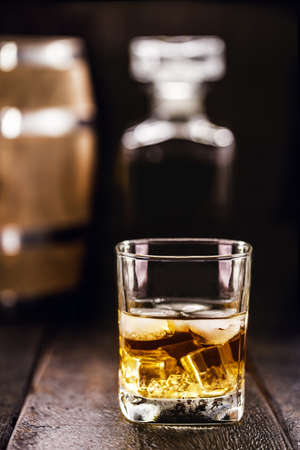 glass of aged whiskey, grain distilled alcohol, with malt, aged in barrelsの写真素材