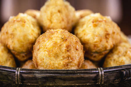 Brazilian rice cake, made in a wing, fried rice appetizer, herbs, seasoning and saltの写真素材