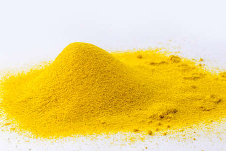 indian spice of turmeric powder, ground turmeric powder, pile of curryの写真素材