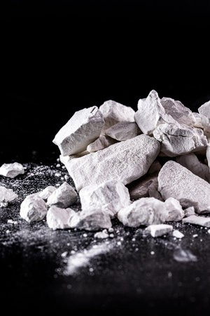 Calcium and Magnesium stones, black background. Called virgin lime or quicklimeの写真素材