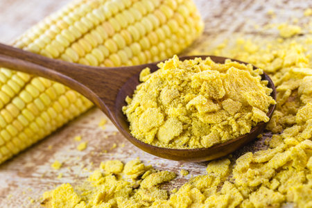 Brazilian cornmeal in flakes, toasted and dried. Brazilian culinary ingredient of the traditional food called Couscousの写真素材