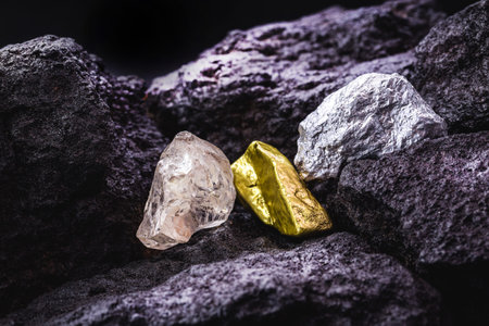 gold, silver and rough diamond, stones and precious metals in coal mine, concept of myeralogyの写真素材