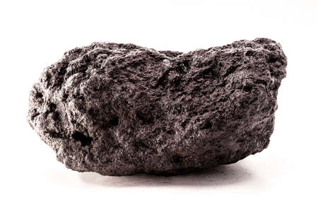large piece of mineral coal used in industrial fuel, on isolated white backgroundの写真素材