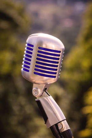 vintage microphone, metallic retro style. Outdoor live show concept.の写真素材