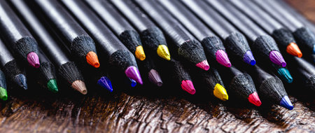 macro photograph of professional colored pencil, under rustic wooden table, with copyspace for text