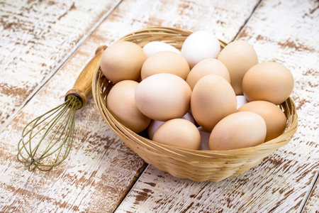 Brazilian free-range chicken eggs in rustic wooden bowl, organic chicken eggs