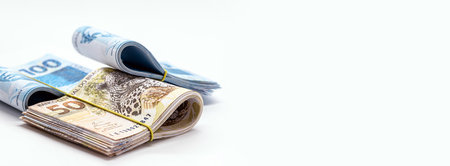 bundles of one hundred reais and fifty reais, money from Brazil, government financial aid, retirement, paydayの写真素材