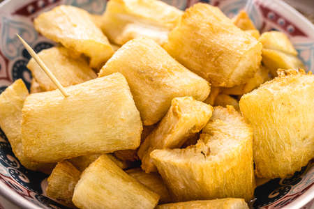 fried cassava, snack made from cassava root and served fried, traditional south american restaurant food garnishの写真素材