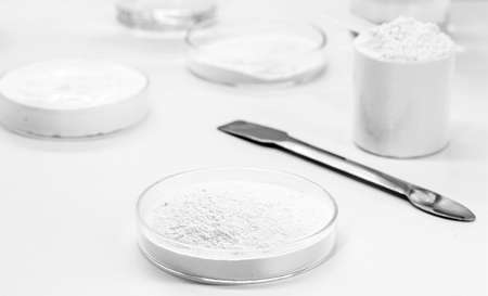 petri dish with crude Benzoyl Peroxide, used in the preparation of cream, lotion or gel in the treatment of acne and dermatosis.の写真素材