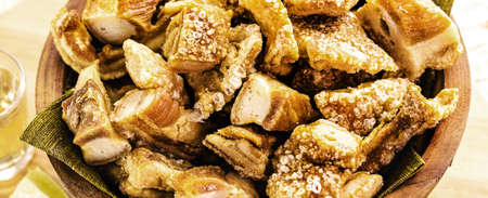 pork, fried and crispy pork belly, typical Brazilian appetizer, traditional food from Minas Geraisの写真素材