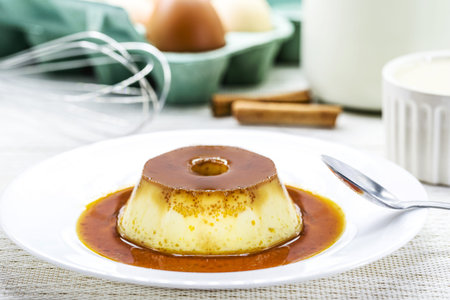 dessert of condensed milk pudding, typical Brazilian sweet, made with eggs, condensed milk, vanilla...