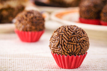homemade candy called brigadeiro, traditional Brazilian birthday party candy, made with condensed...