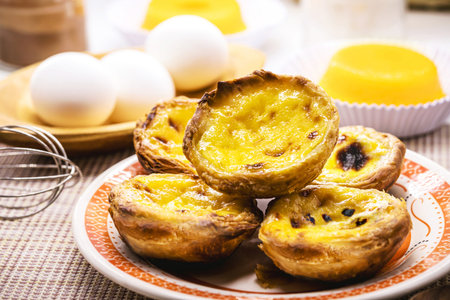 Pastel de nata, called Pastel de Belem, traditional Portuguese crunchy and sour sweet made with...