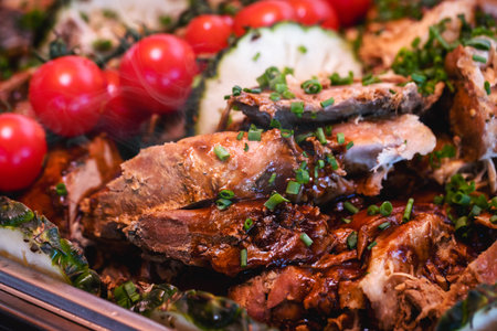 pork loin with vegetables, roast beef, served in a Brazilian restaurant or buffet, typical food for...