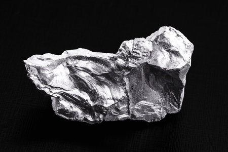 bismuth stone, lead-free metal used in the manufacture of medicines, black background, isolatedの写真素材
