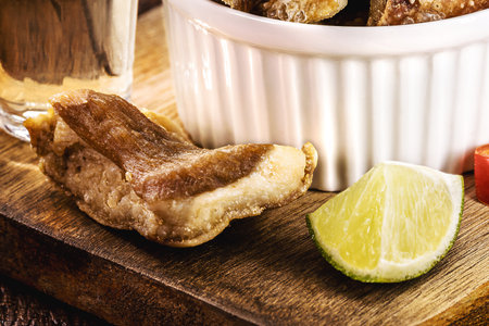 pork belly meat snack, crispy crackling typical of Minas Gerais, served with Brazilian cachaÃ§a, bar foodの写真素材