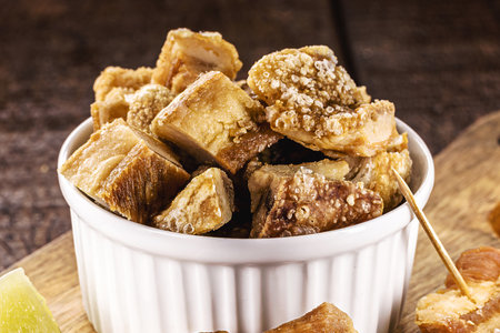 Crackling bowl, Brazilian appetizer made by frying bacon, leather or meat and lots of fat, taken from the pork belly.の写真素材