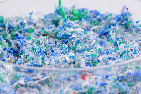 traces of plastic and microplastic in petri dishes, the main pollutant of the oceans, solid particles based on polymers.の写真素材