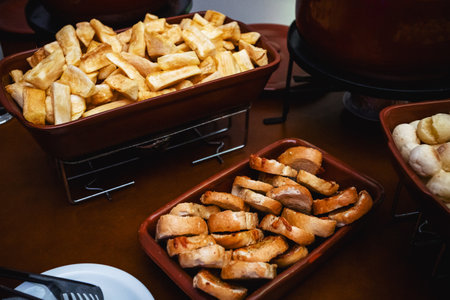 cassava and French bread, Self service, restaurant food by the kilo, served in Brazil, with typical Brazilian foodsの写真素材