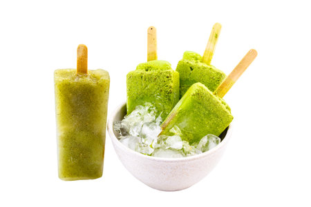 kiwi popsicle isolated on white background made with fresh fruits insideの写真素材