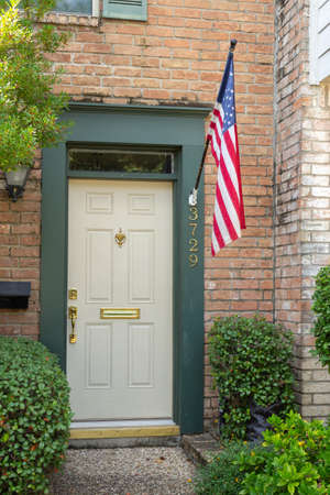 door way with an american flagの写真素材