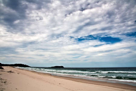 Beautiful beach showing detailed skyの写真素材