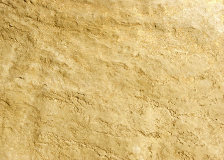 Gold rock texture shot close-up at shallow dof.