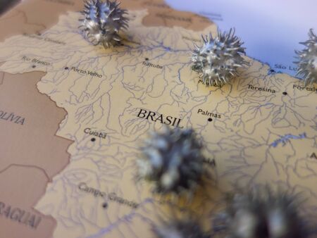Caston beans painted in silver representing the spread of coronavirus in Brazilの写真素材