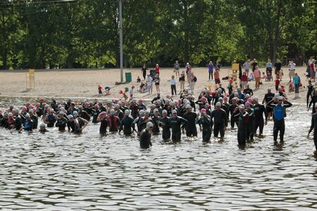 Swimmers gather for the start at the Ottawa Riverkeeper Triathlon 2009.のeditorial素材