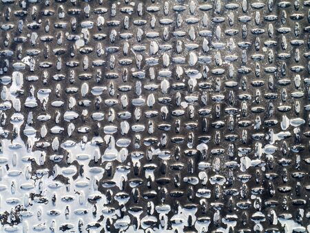 Metal floor plate with traction grid, White paint is wearing off の写真素材