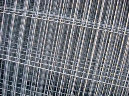 A leaning stack of meshed wire  Fencing or concrete reinforcement material の写真素材