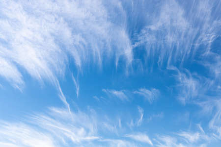 Blue sky with feather white cloud. Pattern of cloud on sunny dayの写真素材