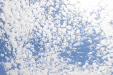 Bright blue sky with feather white cloud.の写真素材