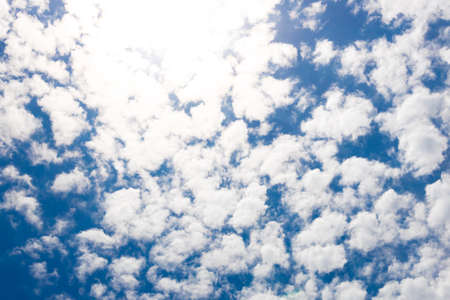 Bright blue sky with feather white cloud.の写真素材