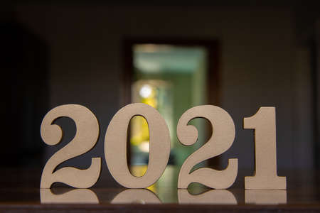 New year background with shiny golden numbers 2021. Minimalistic concept mirror reflection.の写真素材