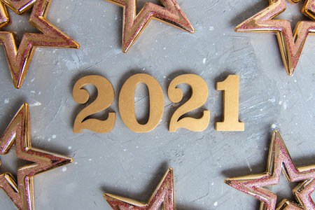 New year background with shiny golden numbers 2021. Minimalistic concept .