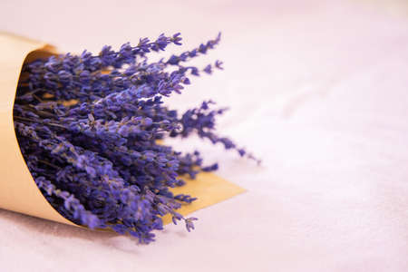 Lavender flowers on light background with copy space. Bouquet of violet flower with space for text.の写真素材