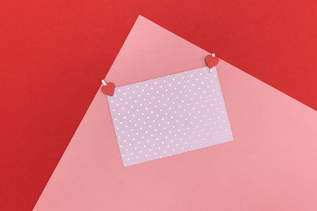 Valentines day red heart on same color background. Monochromatic vivid color. Valentine's day concept. Close up, copy spaceの写真素材