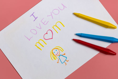 Greeting card for mummy on happy mothers day. Handwritting by kids with love congratulate for mom. Sign I love you momの写真素材