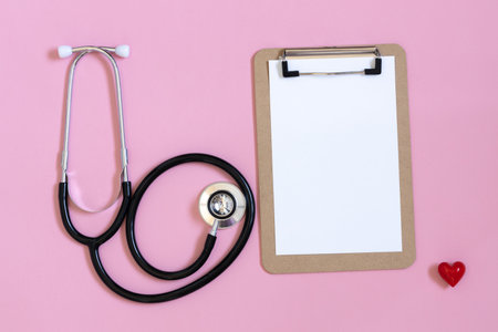 Prescription for medication cardiologist. Congratulation for nurse, doctors, medics day, space for text, pink backgroundの写真素材