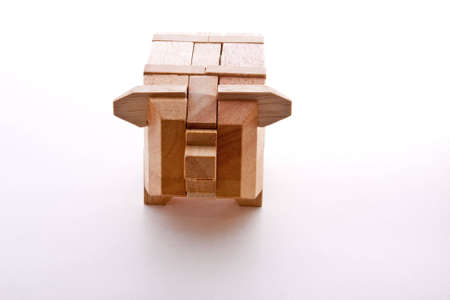 Wooden Pig Interlocking puzzle isolated on whiteの写真素材