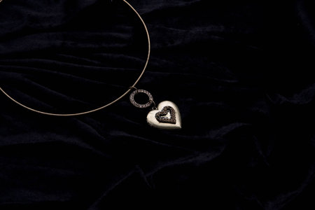 Silver designer costume juwelery on black velvet backgroundの写真素材