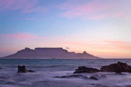 Vista of Table Mountain at dawn as seen from Bloubergstrandの写真素材