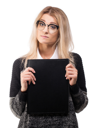 Confused young office manager try to deal with a documents, isolated on whiteの写真素材