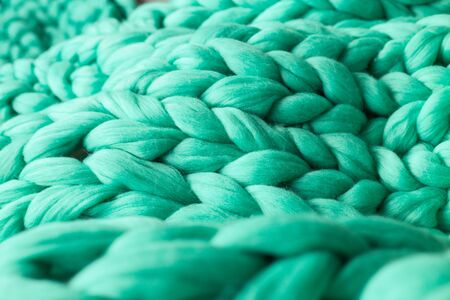 Close-up of knitted blanket, merino wool backgroundの写真素材