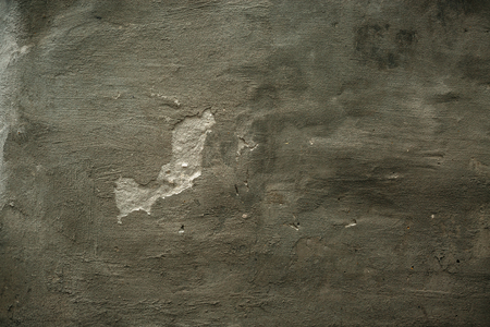 Cracked old stone wall background, stone grunge texture close up.の写真素材
