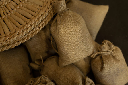 A hat and a mountain of bags with a place for text, for ecological natural products.