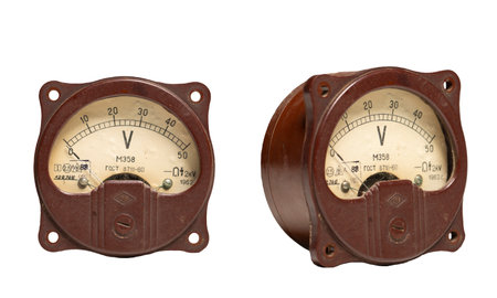 Old measuring device amperemeter on a white background in two anglesの写真素材