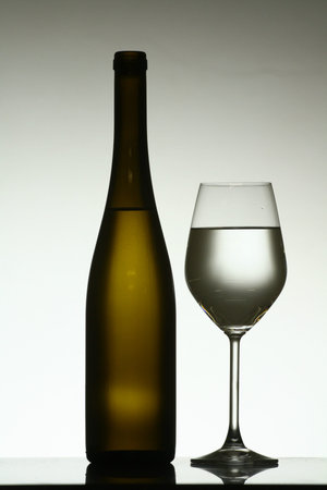 Bottle and glass of wineの写真素材
